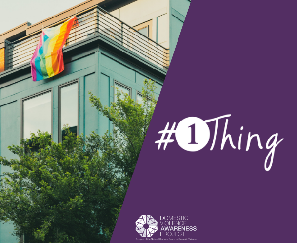 Building with balcony pride flag hanging #1thing