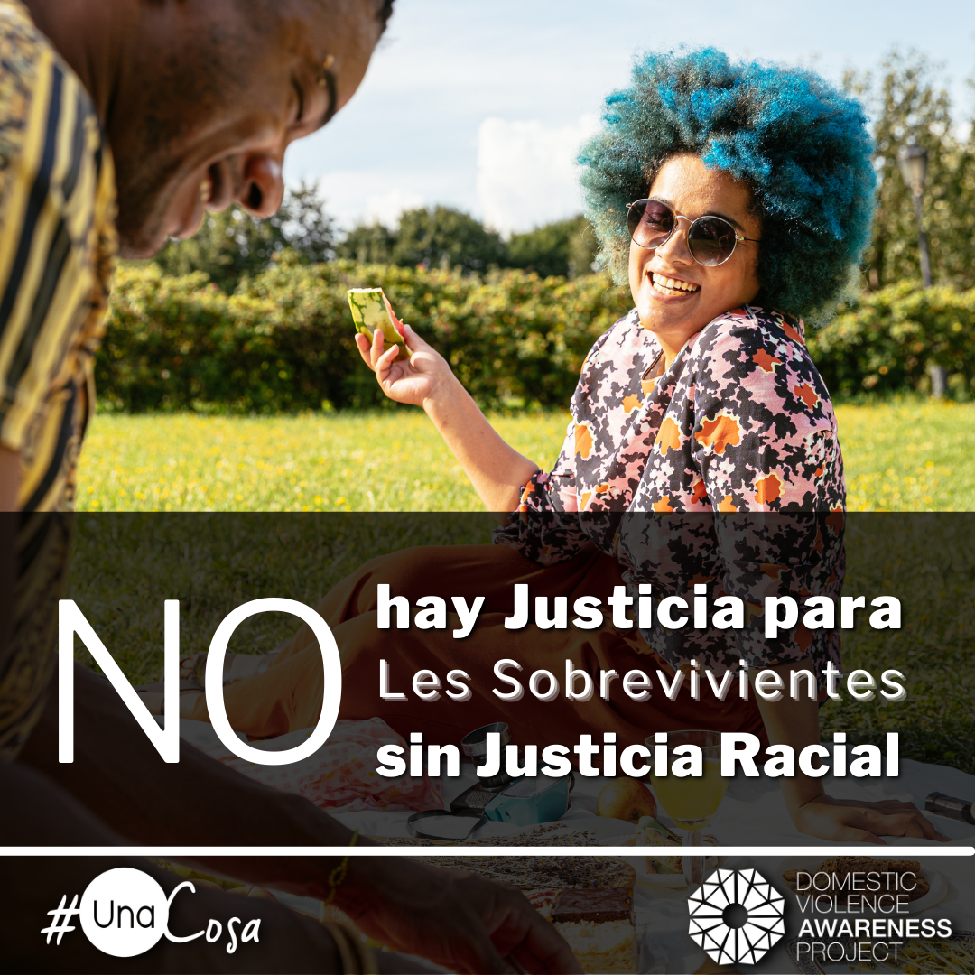 ​  No Survivor Justice without Racial Justice text in spanish overtop of an image of a couple laughing and having a picnic